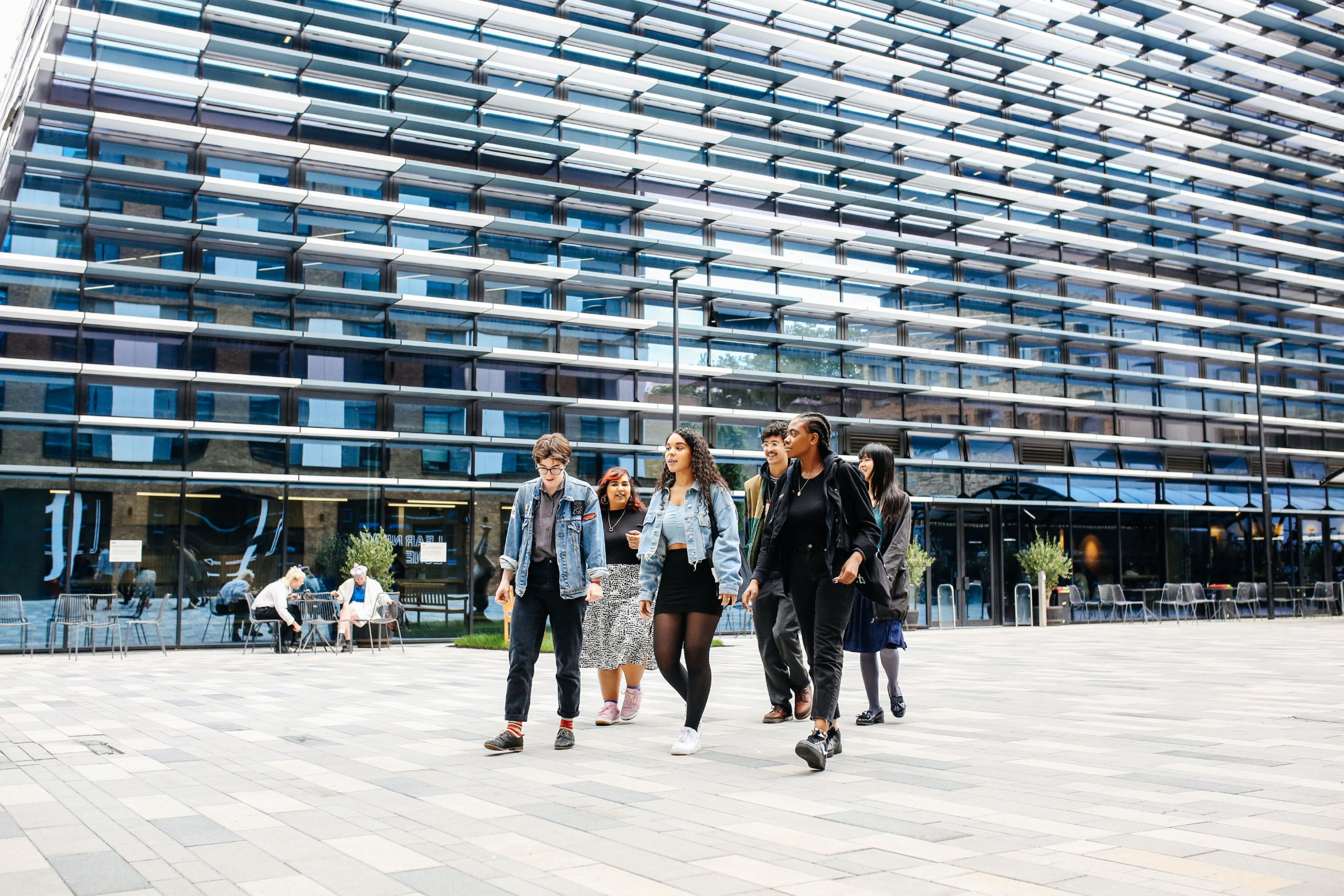 University students walking outside a building